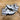 Jordan 4 Retro White Cement (2025) - front